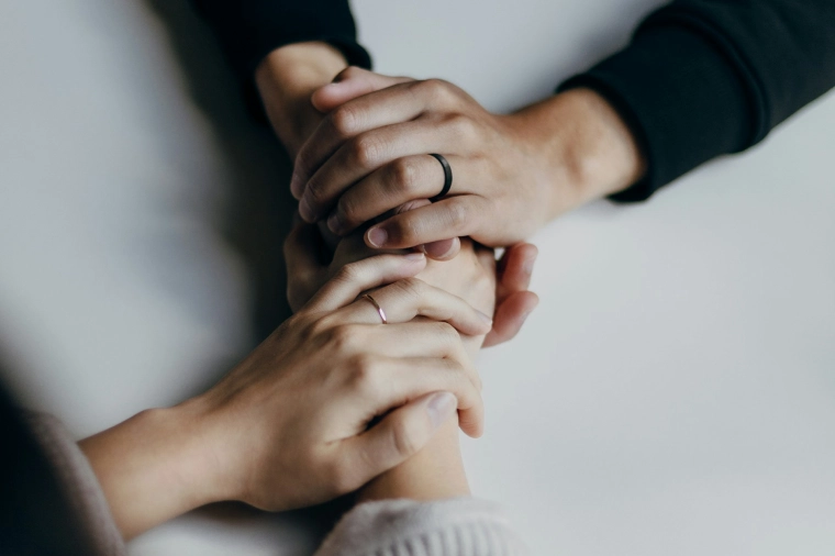 Holding hands for support