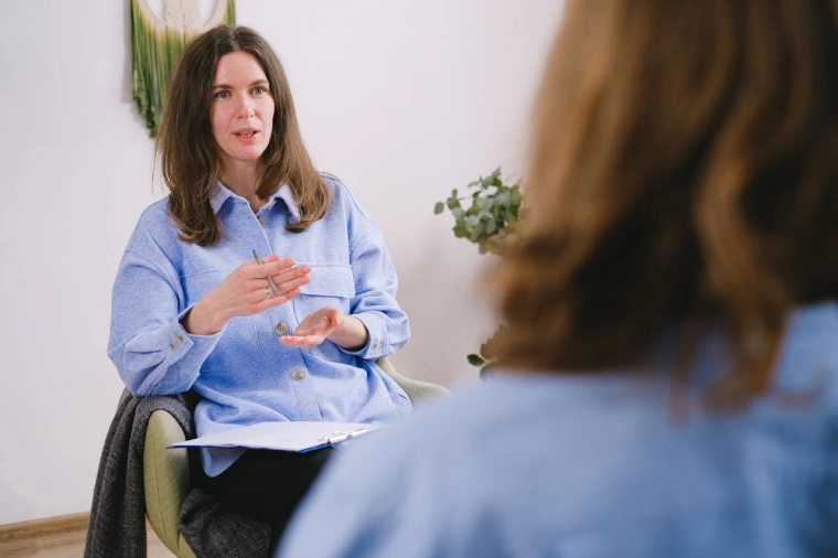 Perth therapist talking to her patient